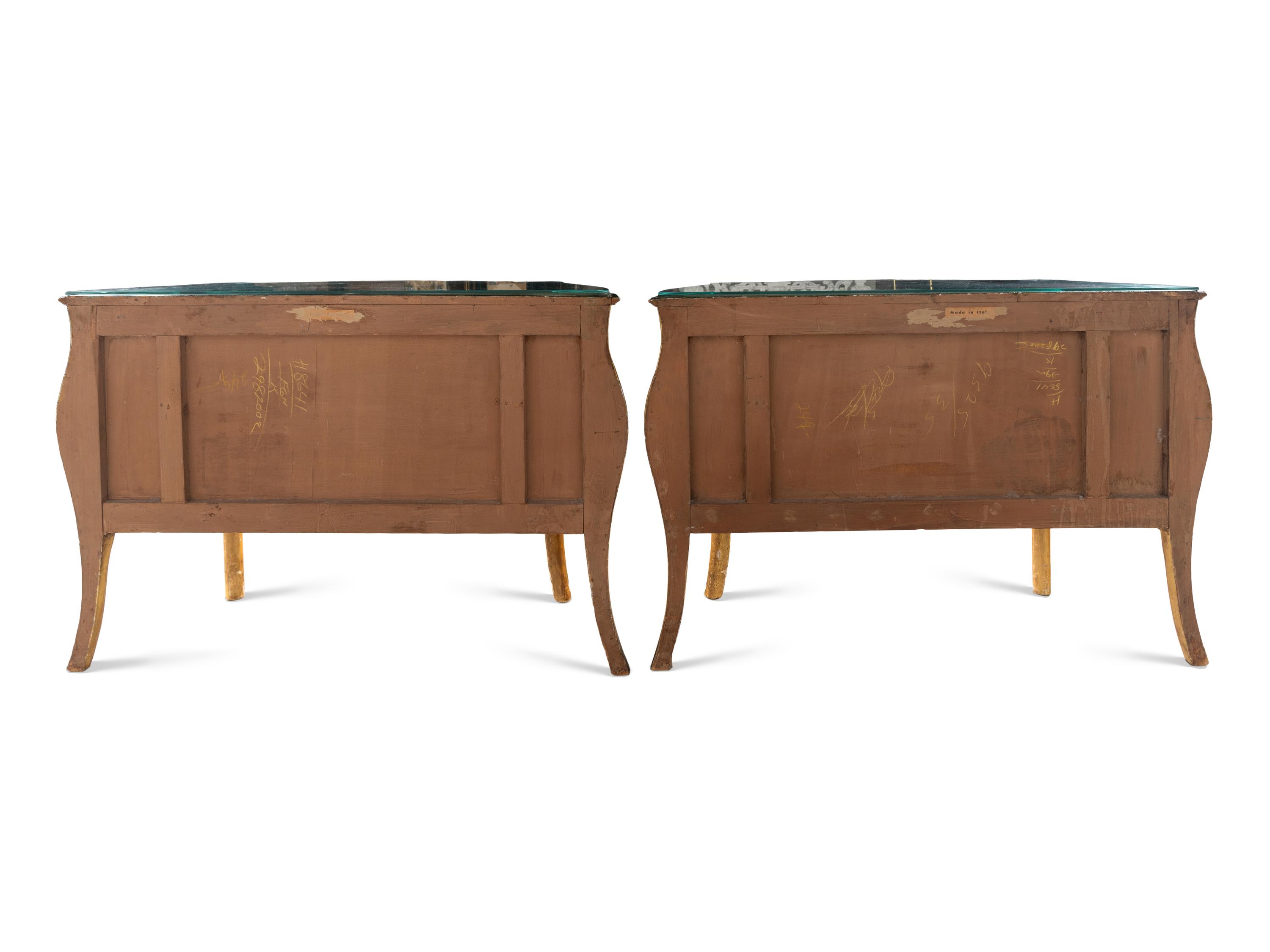 A Pair of Louis XV Style Polychrome Painted Bombé Commodes