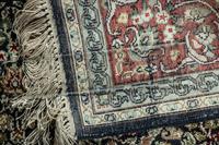 A Silk Tabriz Rug