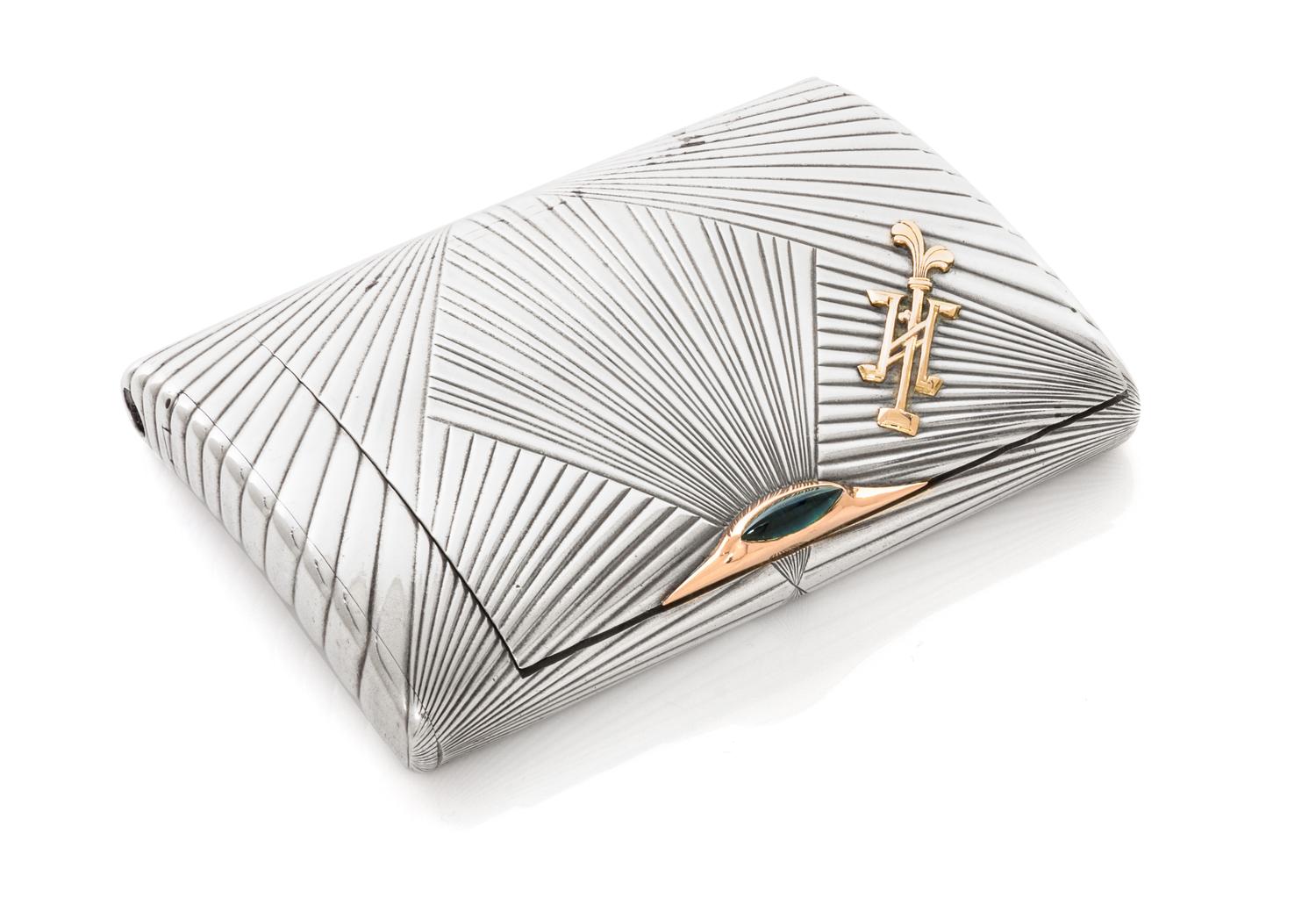 A Russian Silver Cigarette Case, Maker's Mark AK, kokoshnik mark AP, St. Petersburg, the case worked with radiating reeds throughout, t