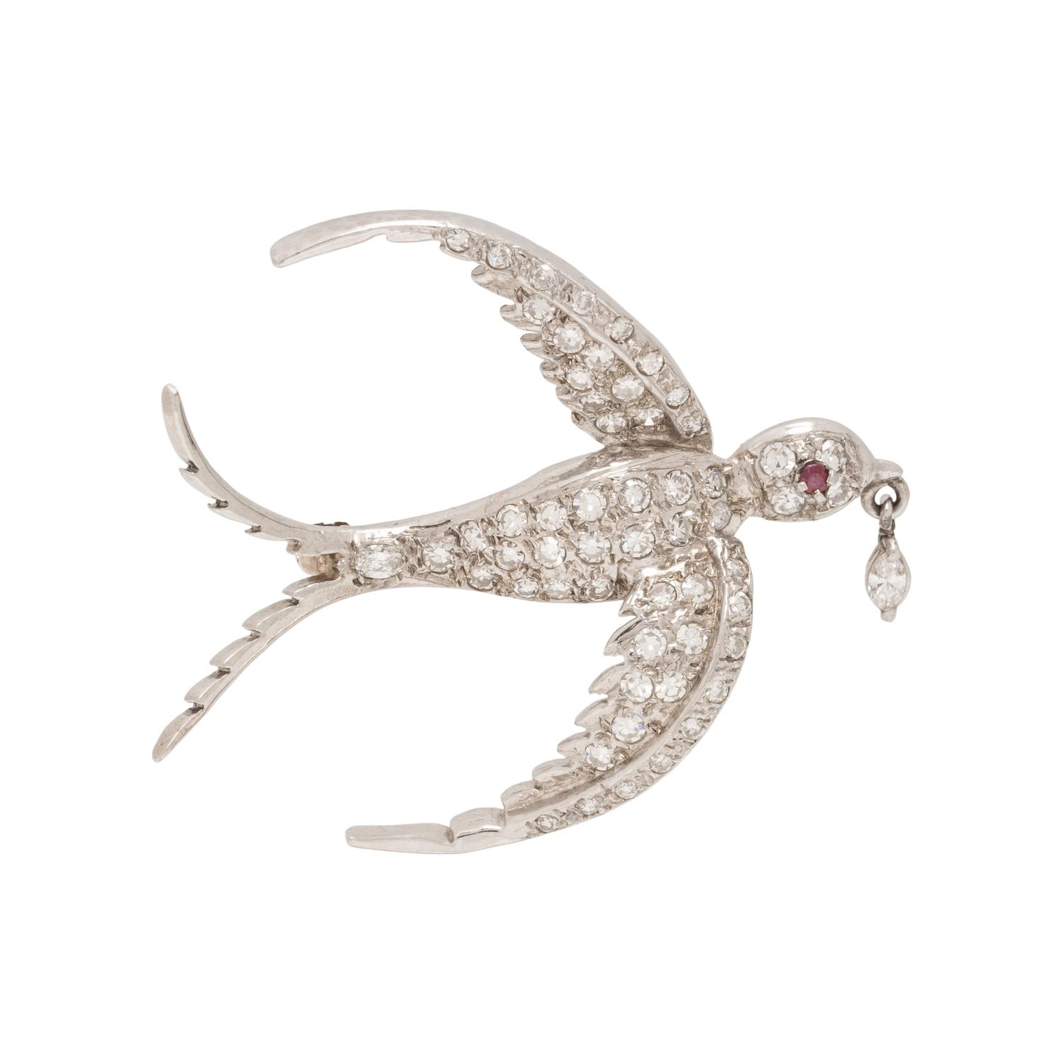 WHITE GOLD AND DIAMOND SWALLOW BROOCH