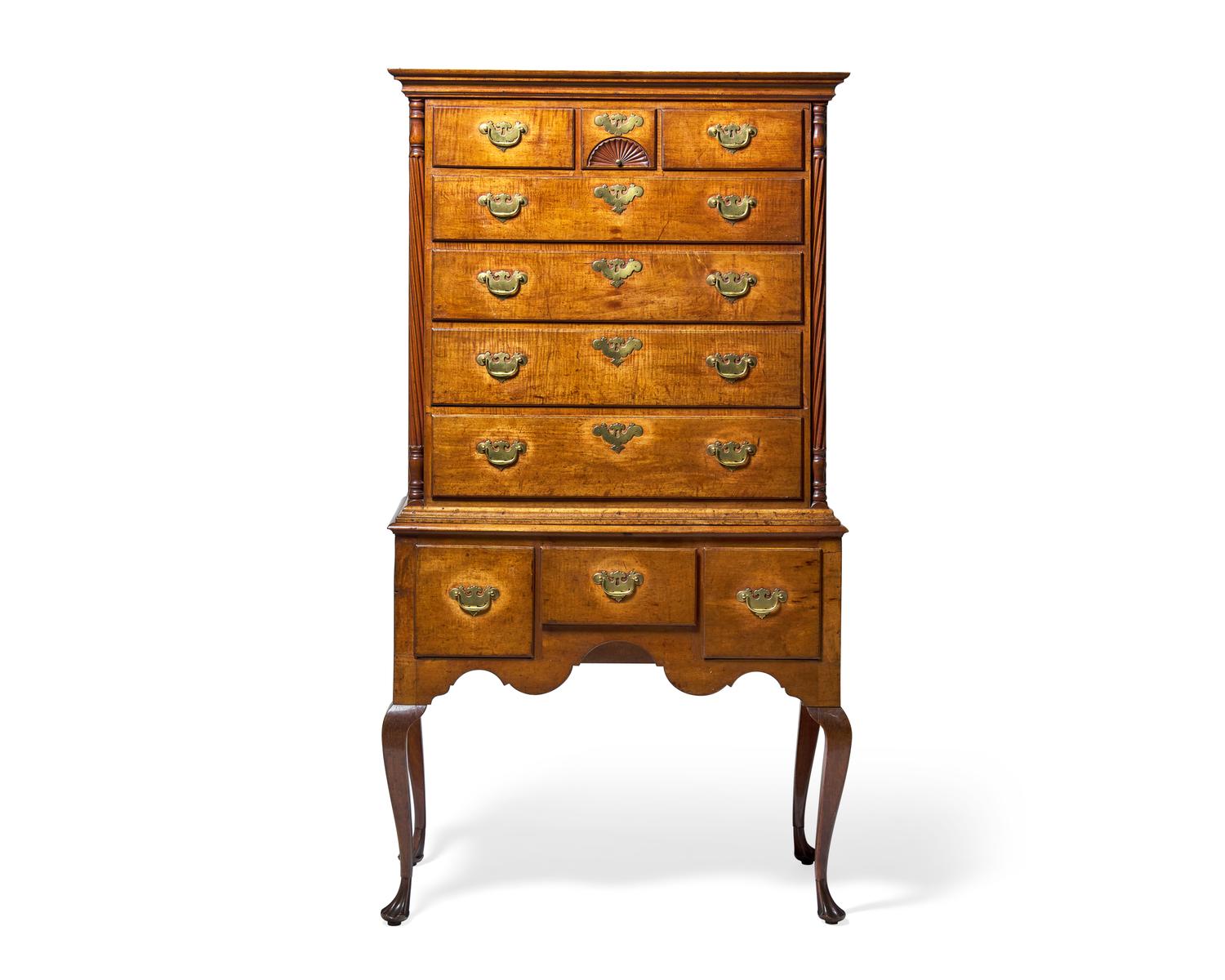 A Queen Anne Carved Figured Maple and Birch Flat-Top High Chest of Drawers