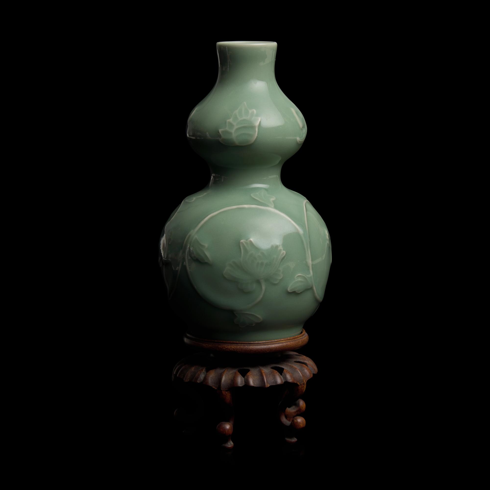 A Japanese Celadon-Glazed Double Gourd Vase, Seifu Yohei III, and Two Kogo, Suwa Sozan