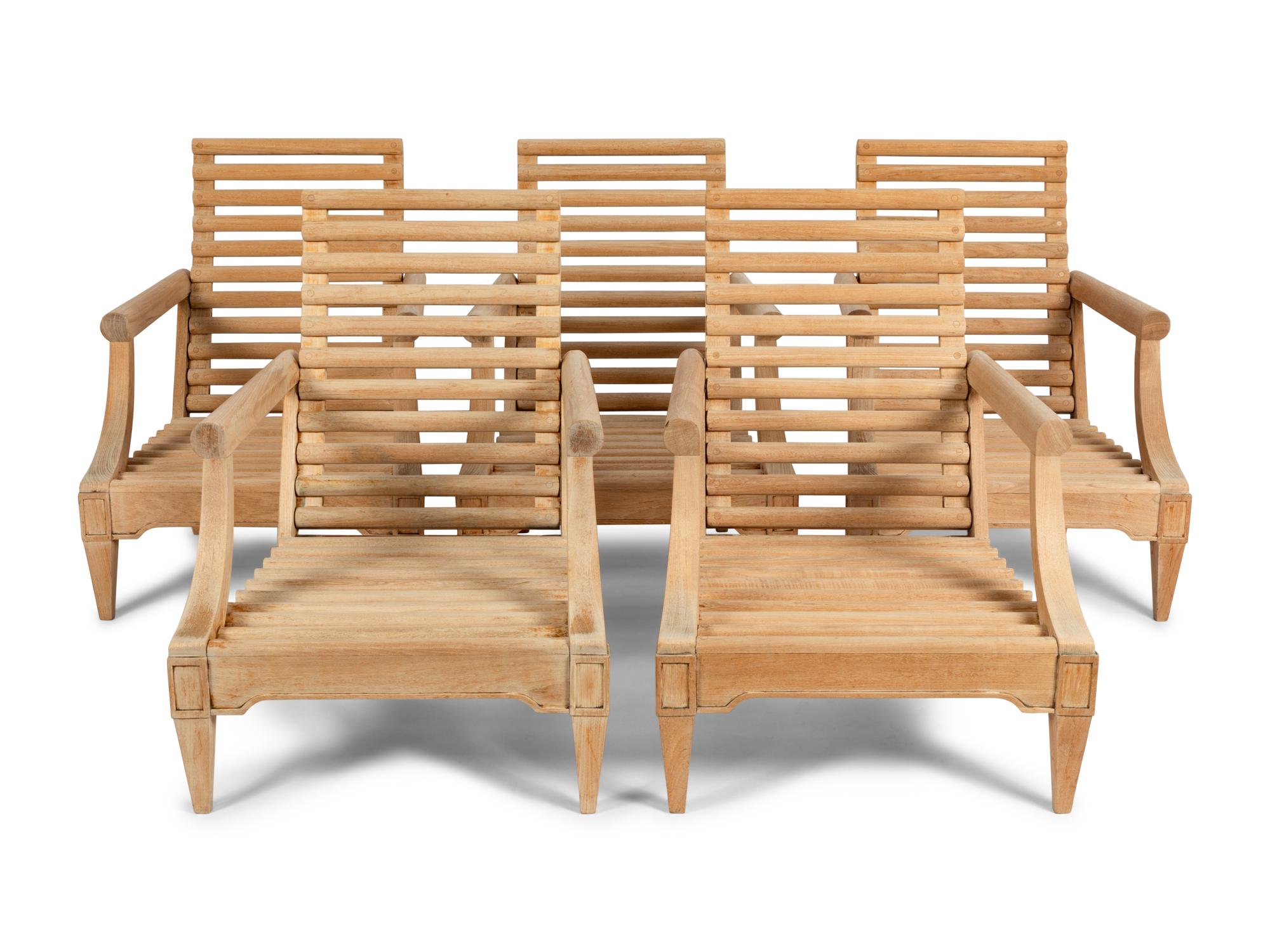 A Teak Outdoor Nine-Piece Furniture Suite