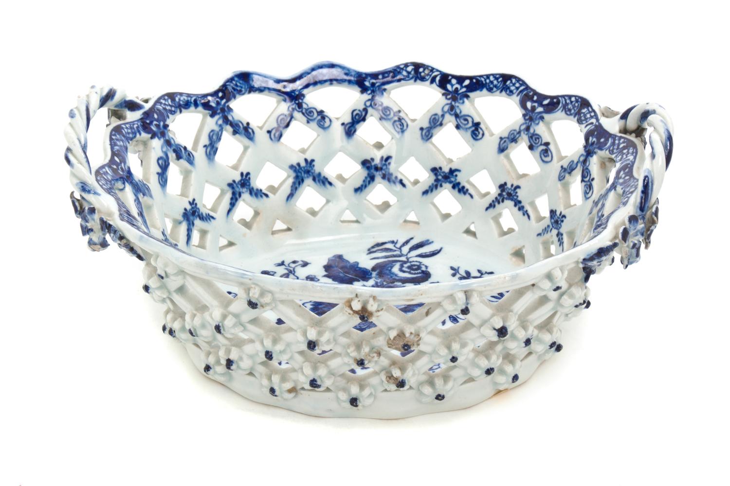 An English Porcelain Reticulated Basket, Width 9 inches.
