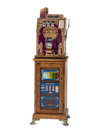 A Mills 5 Cent Special Gold Roman Head Slot Machine on Reverse Printed Glass Inset Golden Nugget Stand