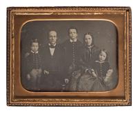 [EARLY PHOTOGRAPHY]. A charming collection of 6 family portrait daguerreotypes and one ambrotype, including:
