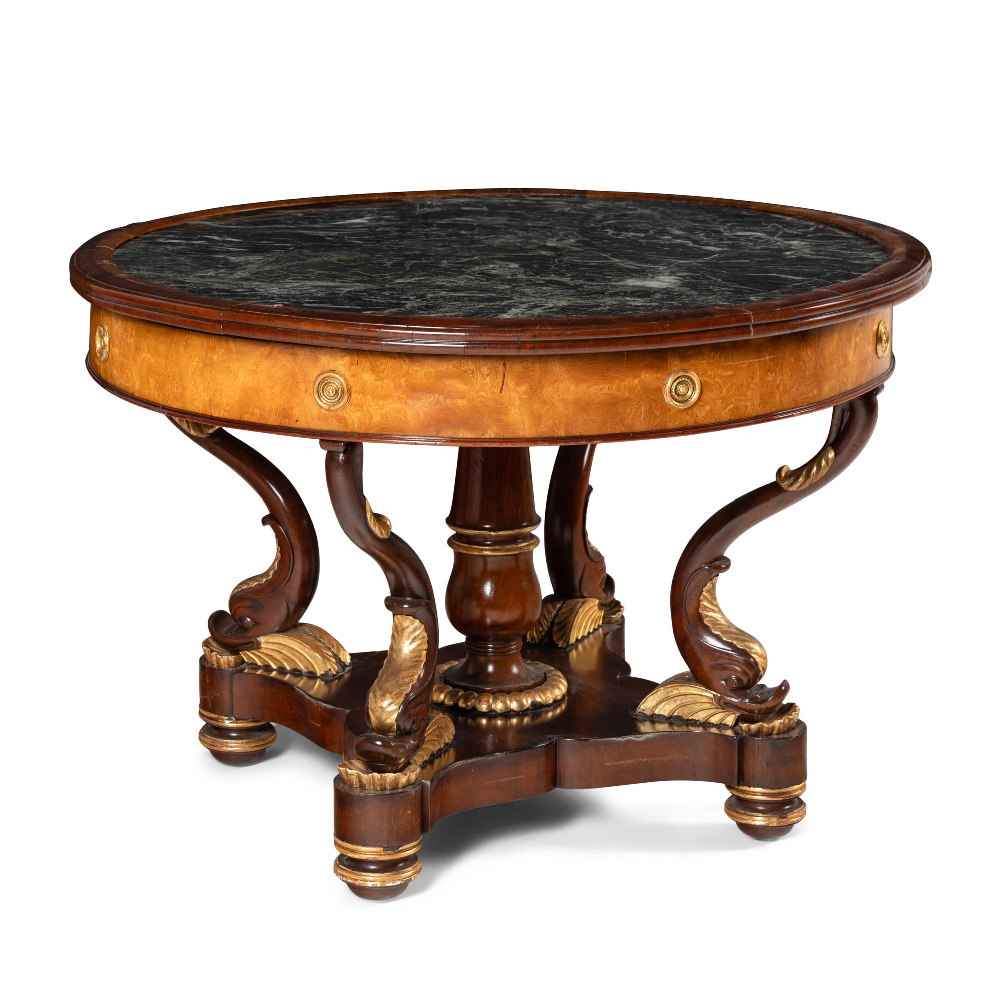 A Late Regency Parcel-Gilt Mahogany and Satinwood Marble-Inset Center Table