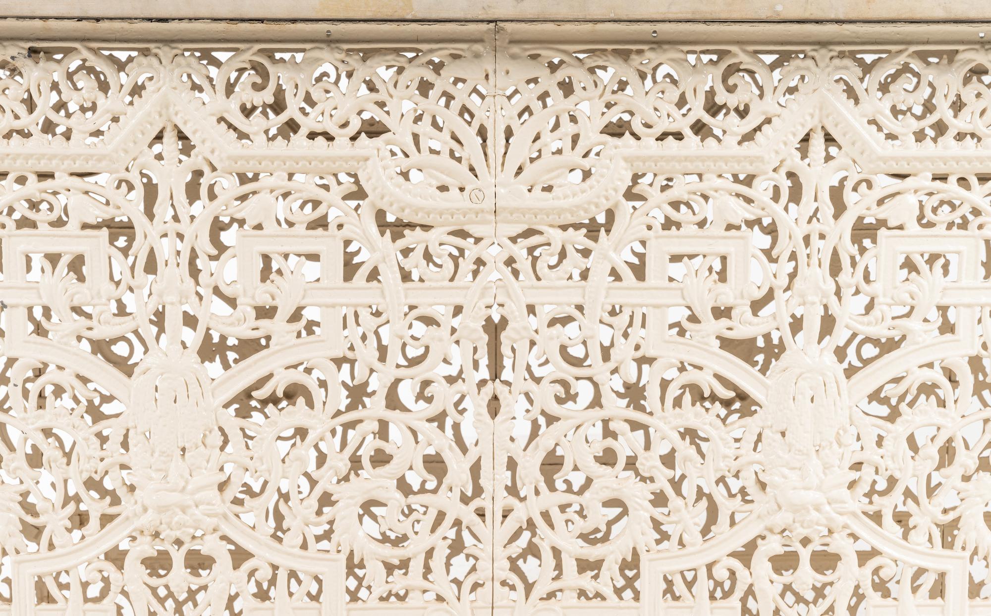 A Victorian White-Painted Cast Iron Marble-Top Radiator Cover