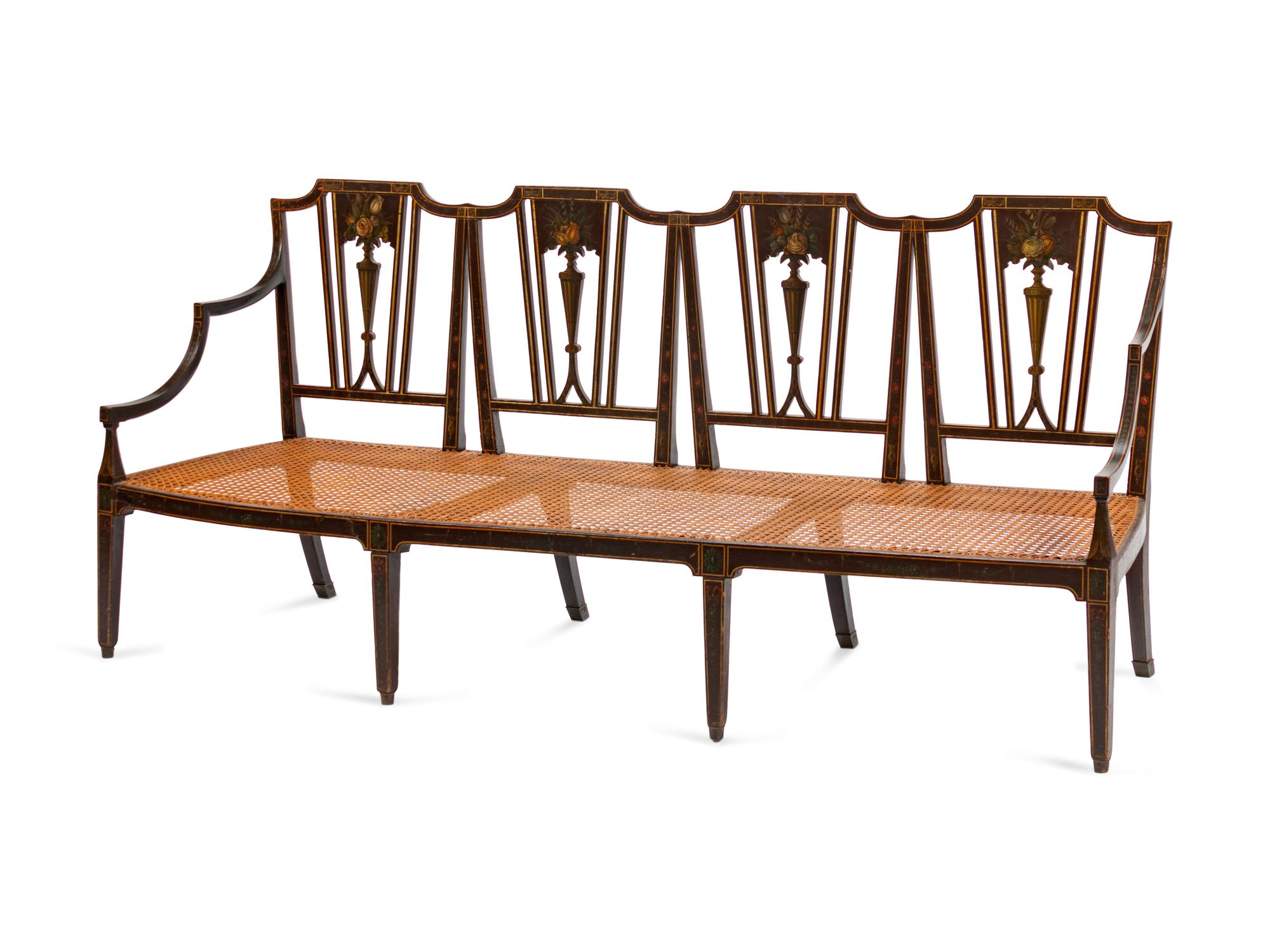 A George III Style Caned and Painted Quadruple Chairback Settee — 19TH CENTURY