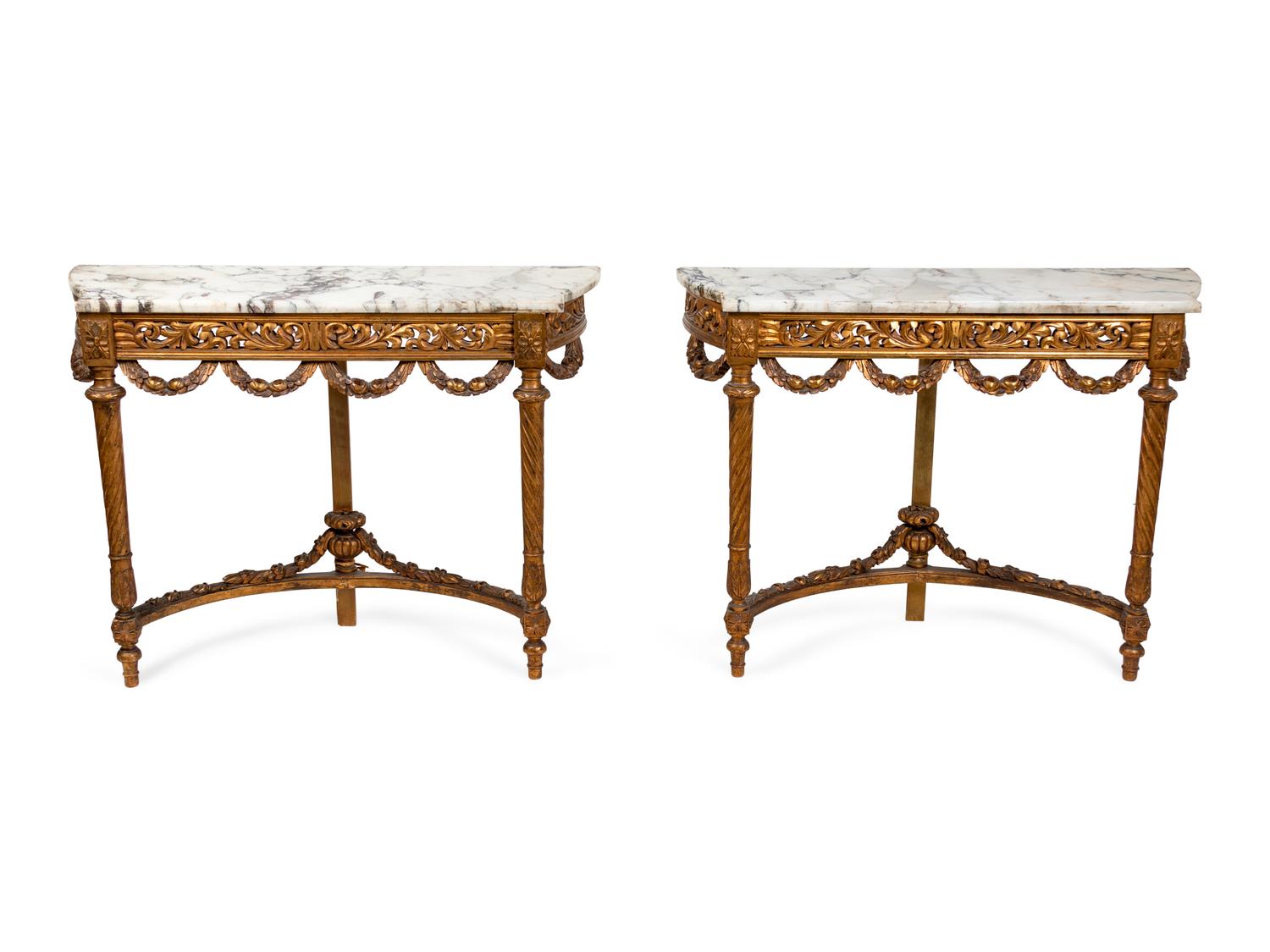 A Pair of Louis XVI Style Giltwood Consoles