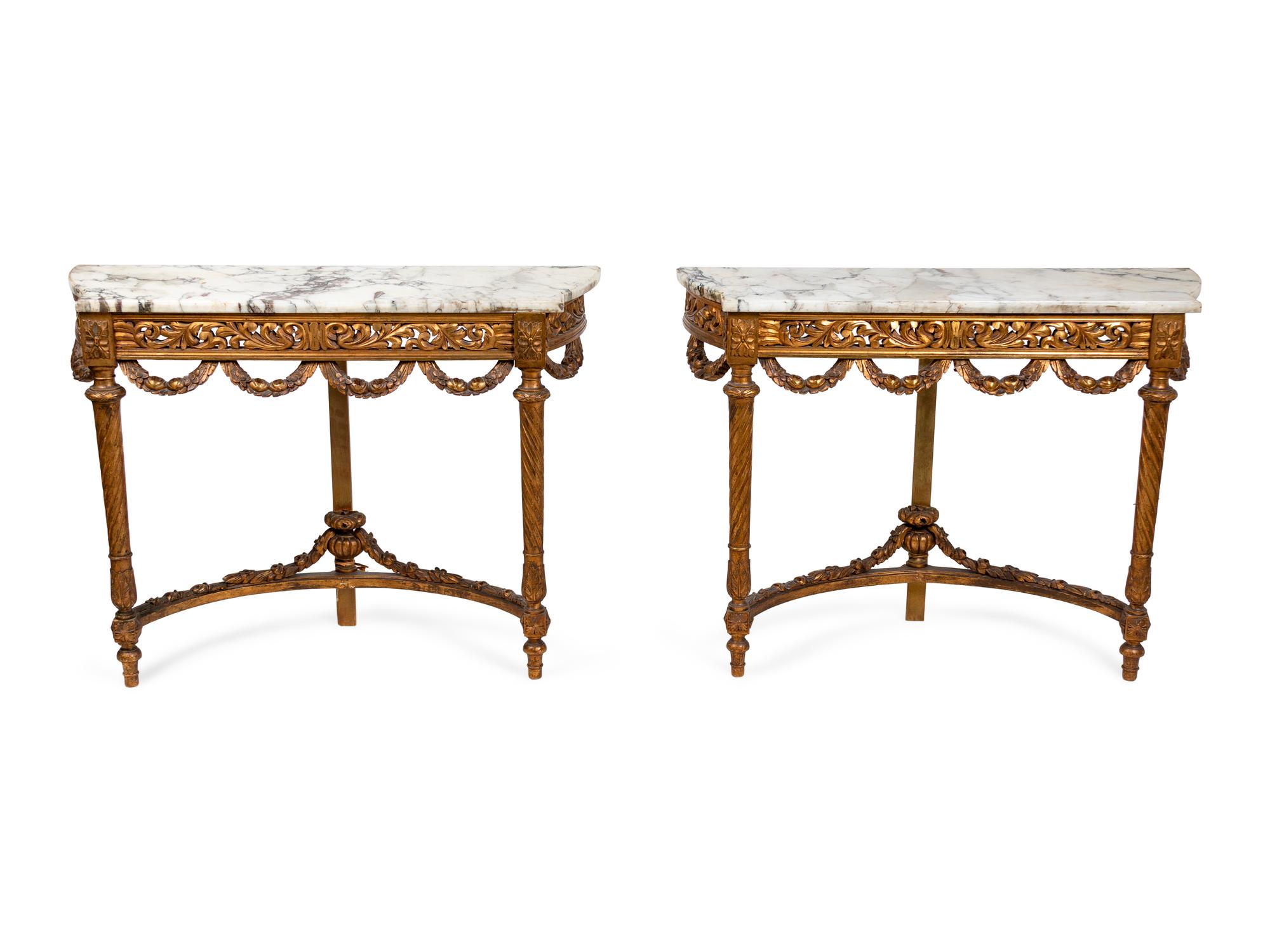 A Pair of Louis XVI Style Giltwood Consoles