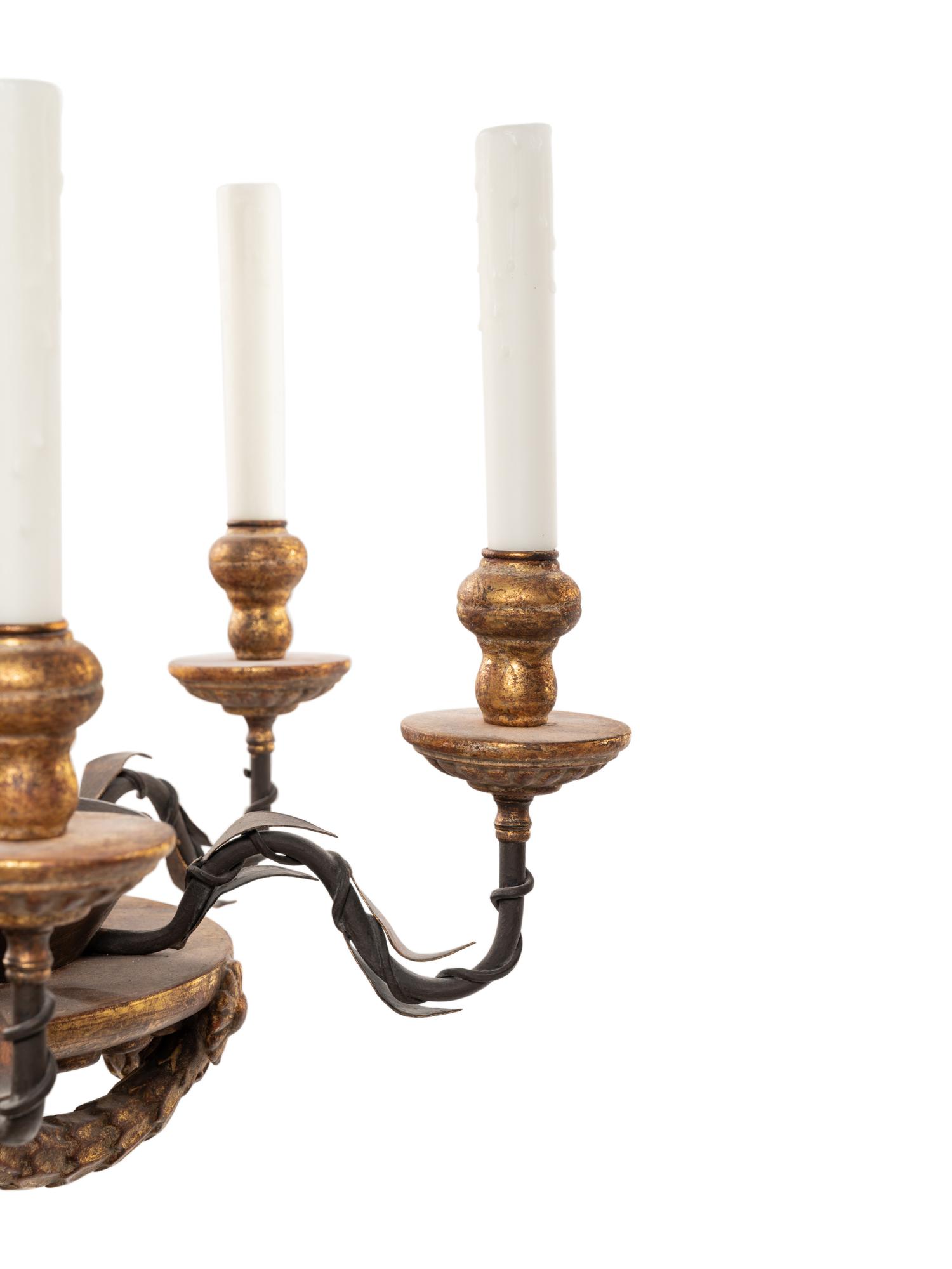 A Neoclassical Parcel Gilt Six-Light Chandelier