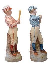 A Pair of German Bisque Porcelain Baseball Figures
