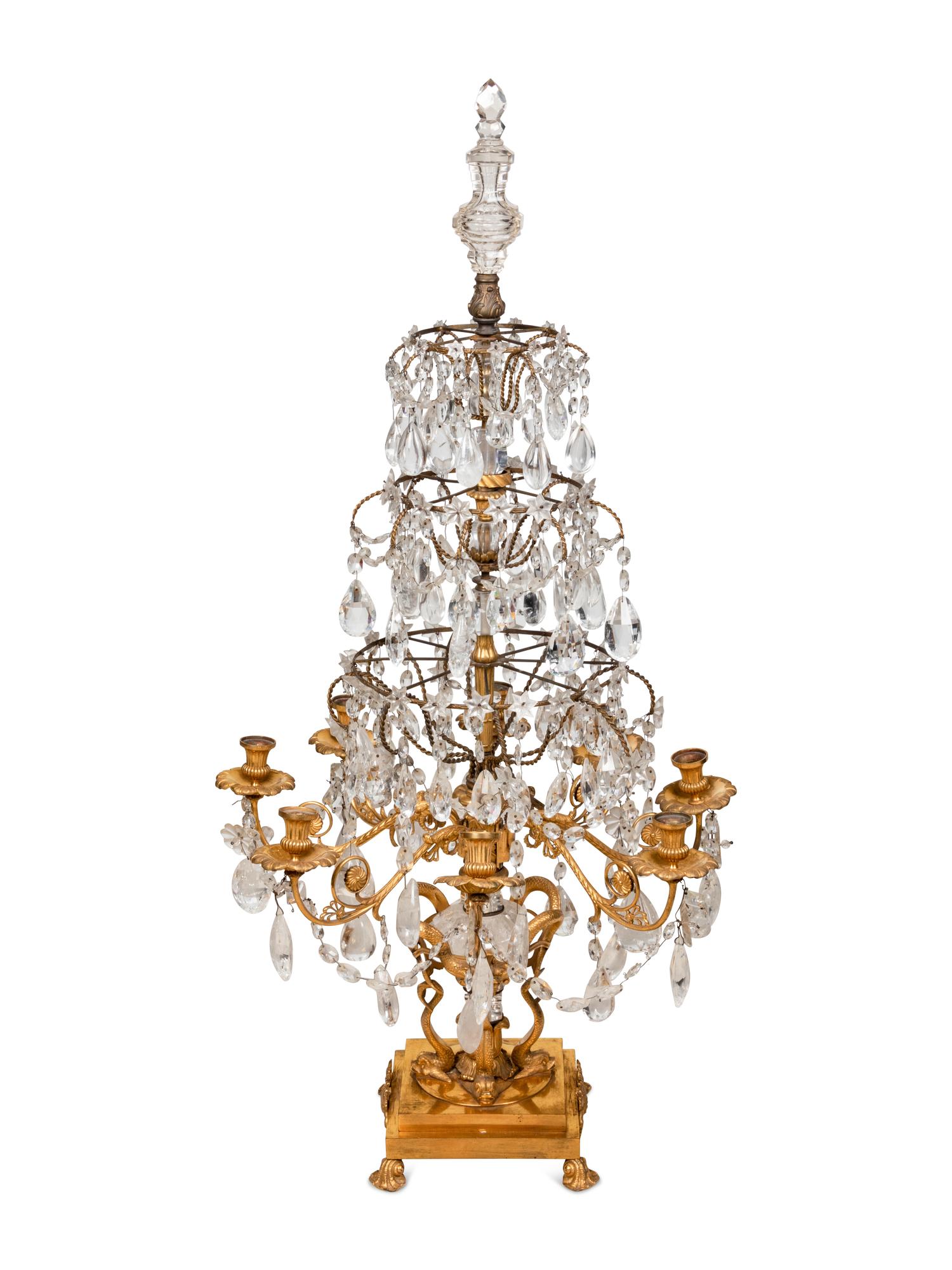 An Empire Style Four-Tier Gilt Bronze and Rock Crystal Eight-Light Girandole