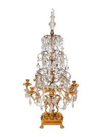 An Empire Style Four-Tier Gilt Bronze and Rock Crystal Eight-Light Girandole