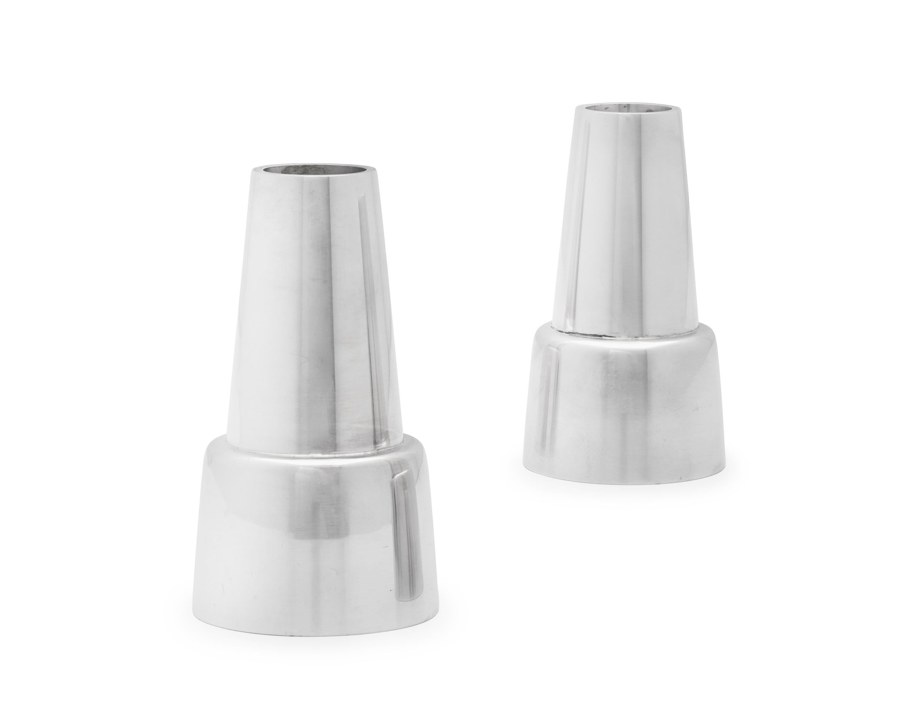 A Pair of Henning Koppel Designed Georg Jensen Silver Candlesticks