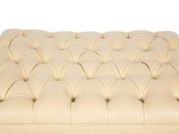 A Louis XVI Style Giltwood and Button Tufted Upholstered Ottoman