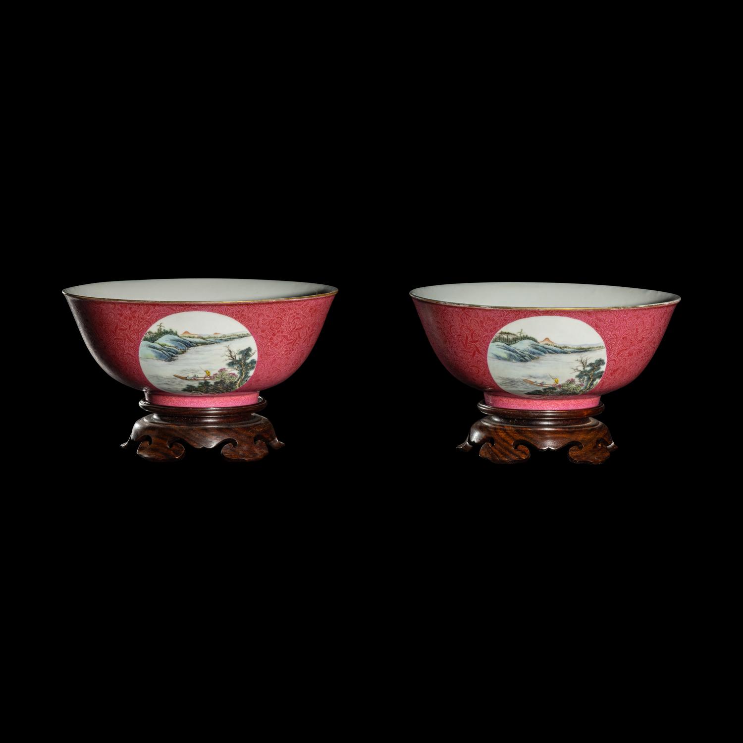 A Pair of Chinese Famille Rose Ruby Ground Porcelain 'Landscapes' Bowls, 20th Century 近代 胭脂紅地軋道開光山水圖碗一對