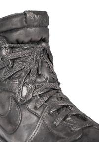 A Nike Air Jordan 1 Silver Cast Basketball Shoe Crafted for Michael Jordan's 32nd Birthday