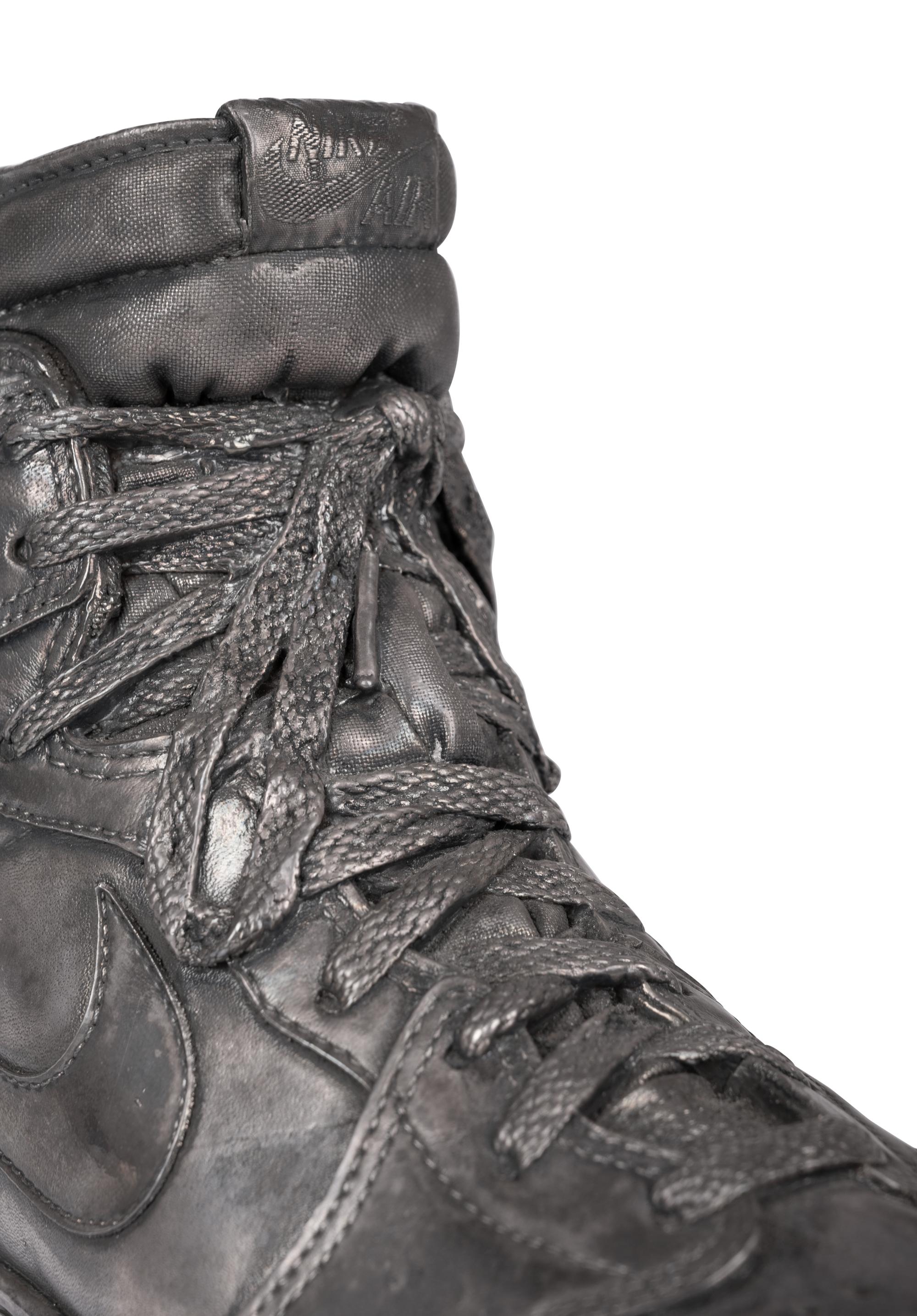 A Nike Air Jordan 1 Silver Cast Basketball Shoe Crafted for Michael Jordan's 32nd Birthday