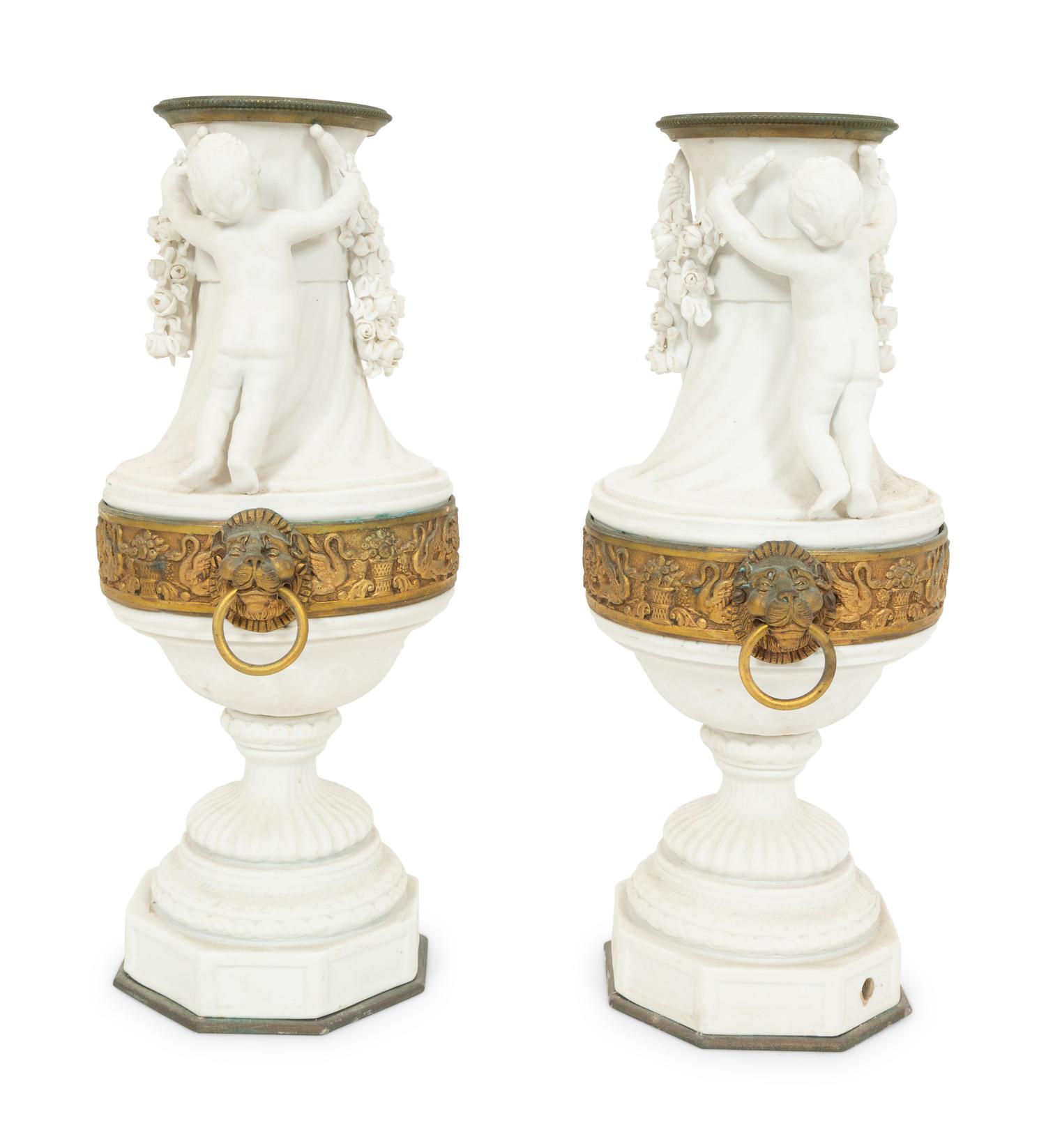 A Pair of Gilt Metal Mounted Bisque Porcelain Urns