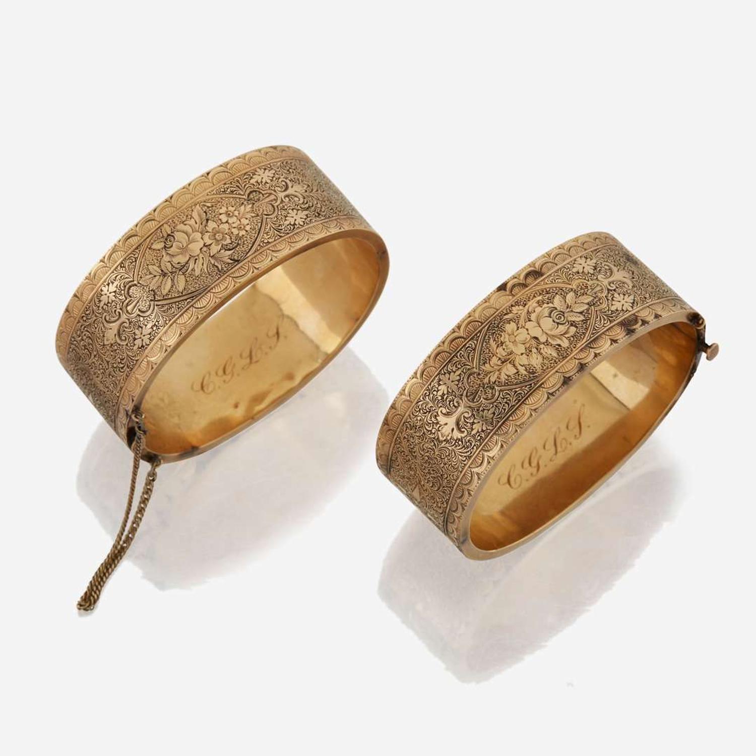 A pair of gold bangle bracelets
