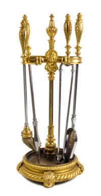 A Set of Gilt Bronze Fireplace Tools on Stand Height of stand 34 1/4 inches. — 19TH/20TH CENTURY