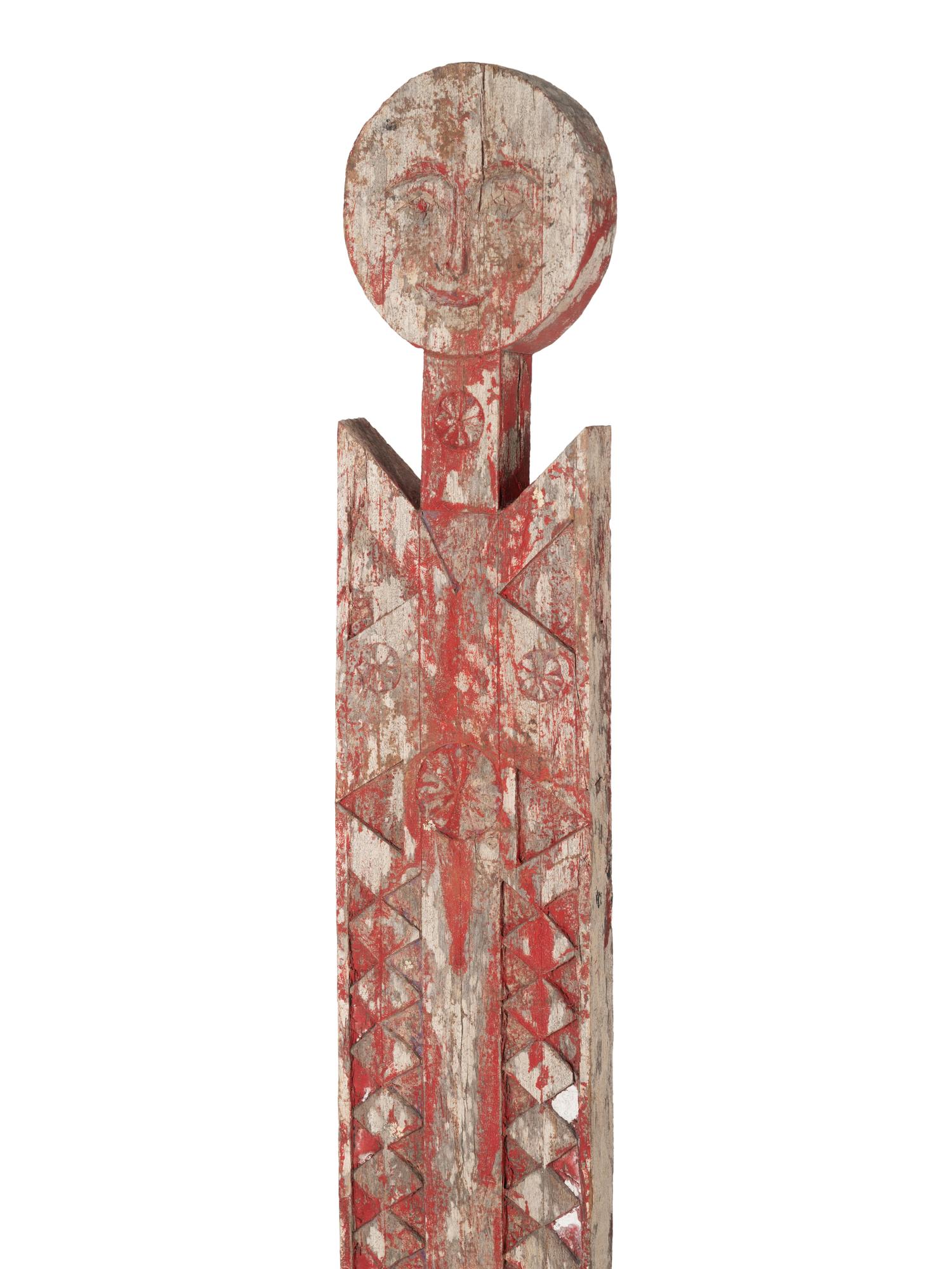 A Group of Three Carved Commemorative Posts
