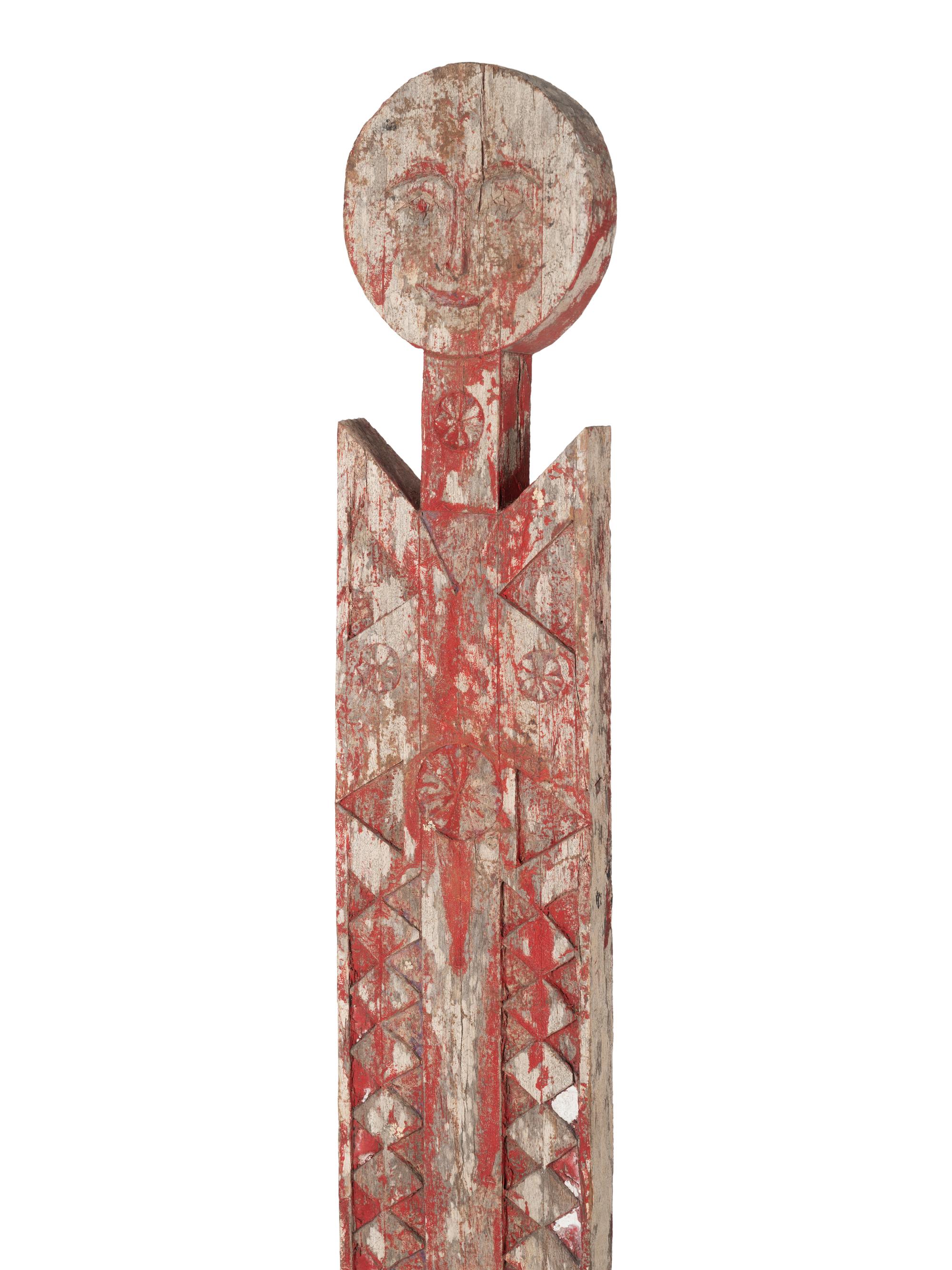 A Group of Three Carved Commemorative Posts