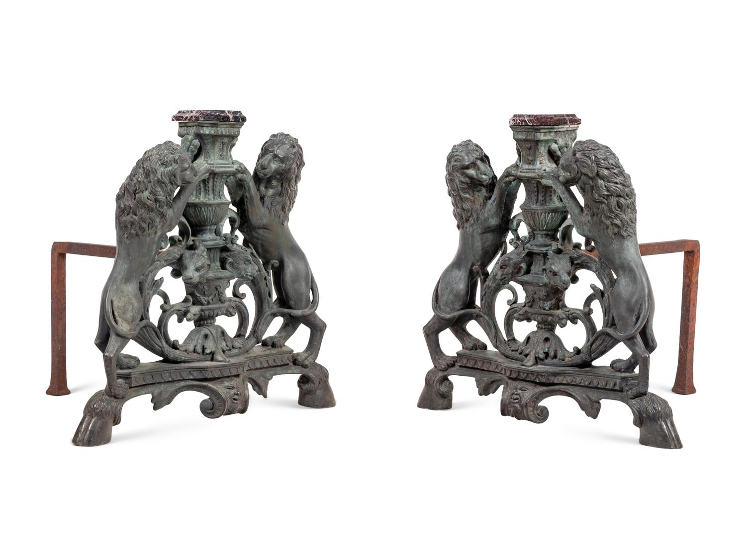A Pair of Continental Cast Metal Andirons