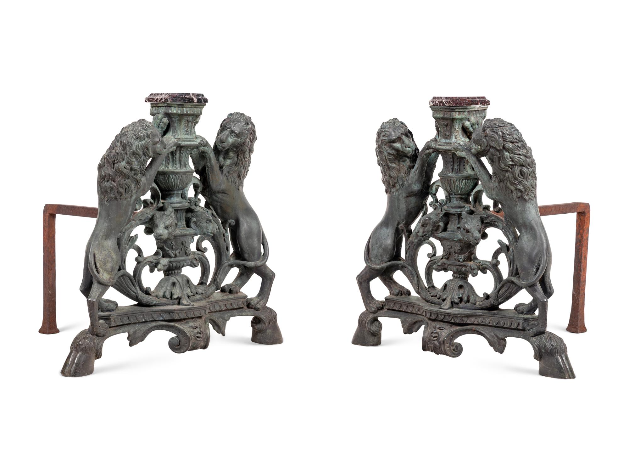 A Pair of Continental Cast Metal Andirons