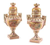 A Pair of Sevres Style Porcelain Potpourri Vases and Covers Height 19 inches.