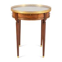 A Louis XVI Style Gilt Bronze Mounted Mahogany Bouillotte Table