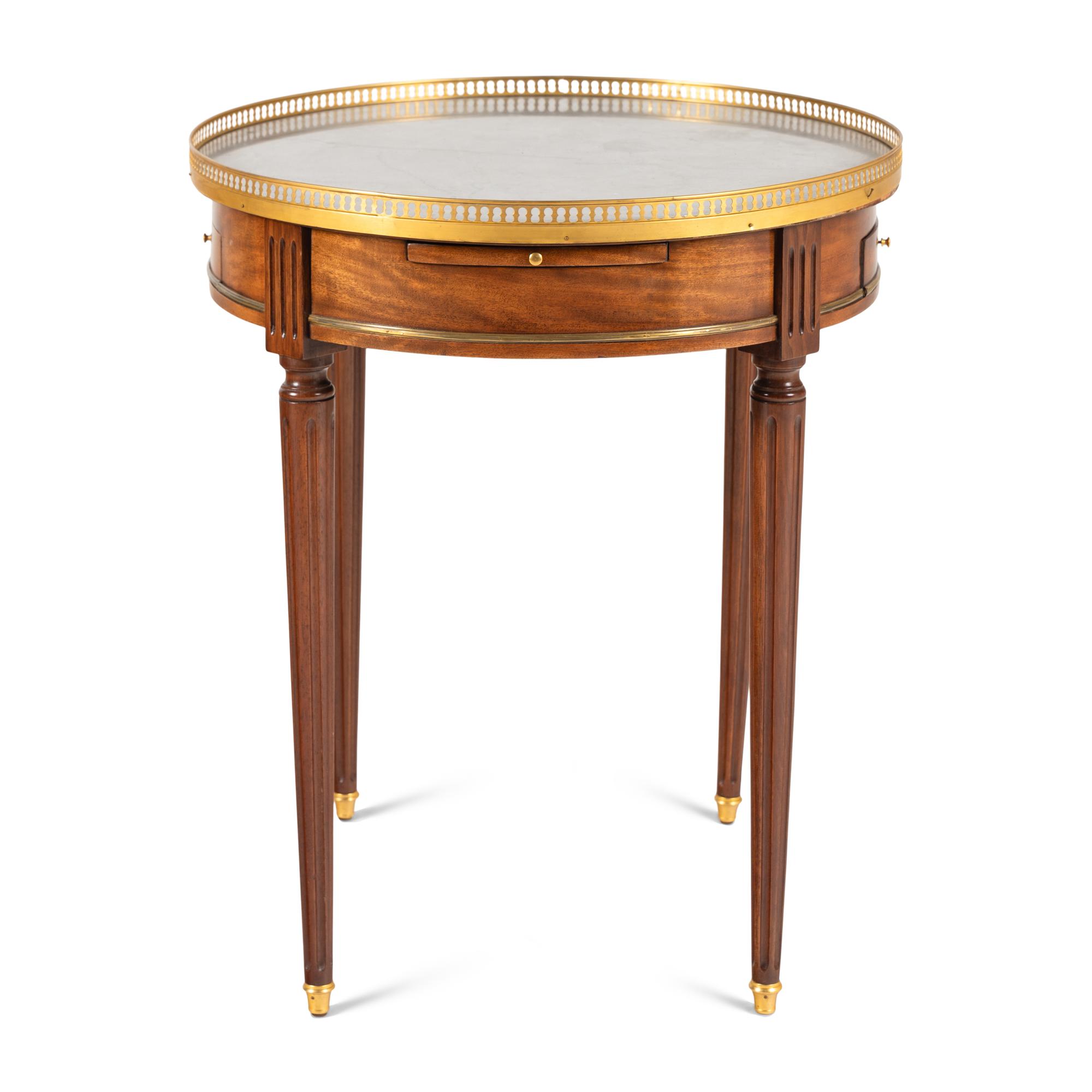 A Louis XVI Style Gilt Bronze Mounted Mahogany Bouillotte Table