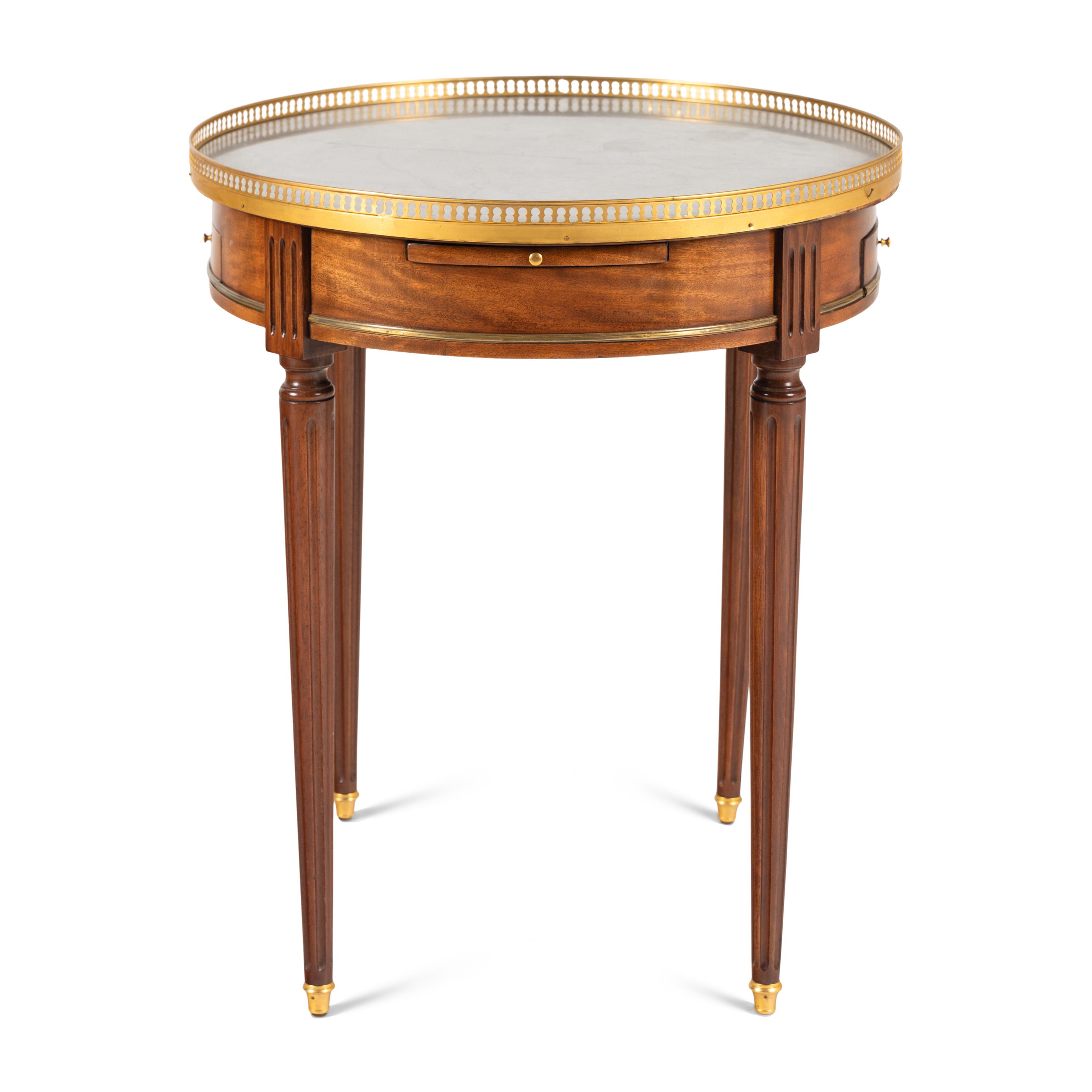 A Louis XVI Style Gilt Bronze Mounted Mahogany Bouillotte Table