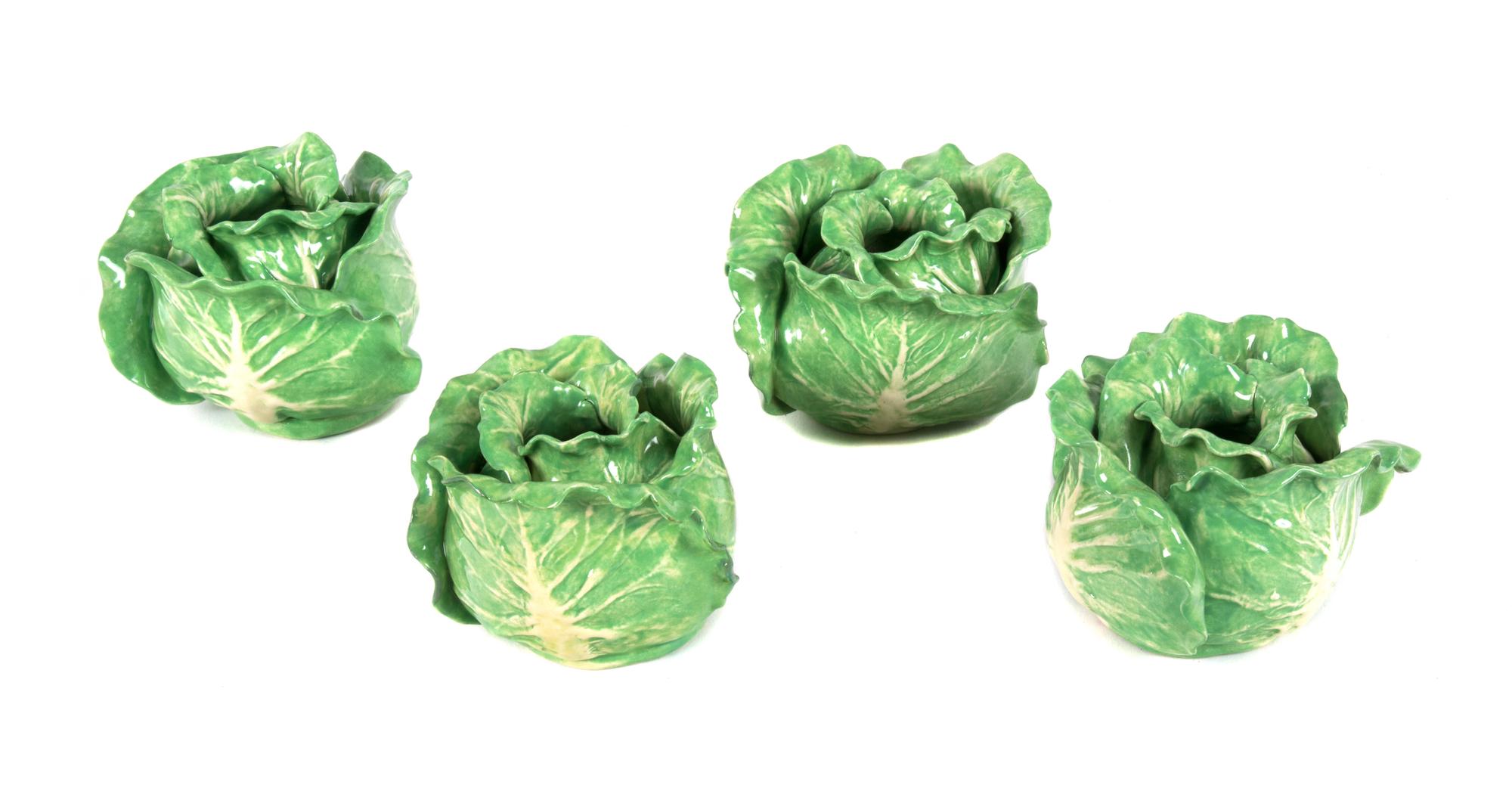 A Set of Four Dodie Thayer Lettuce Ware Candlesticks Height 3 1/2 inches.