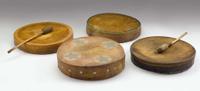 Four hide-covered Sioux hand drums fort yates, north dakota, early to mid 20th century