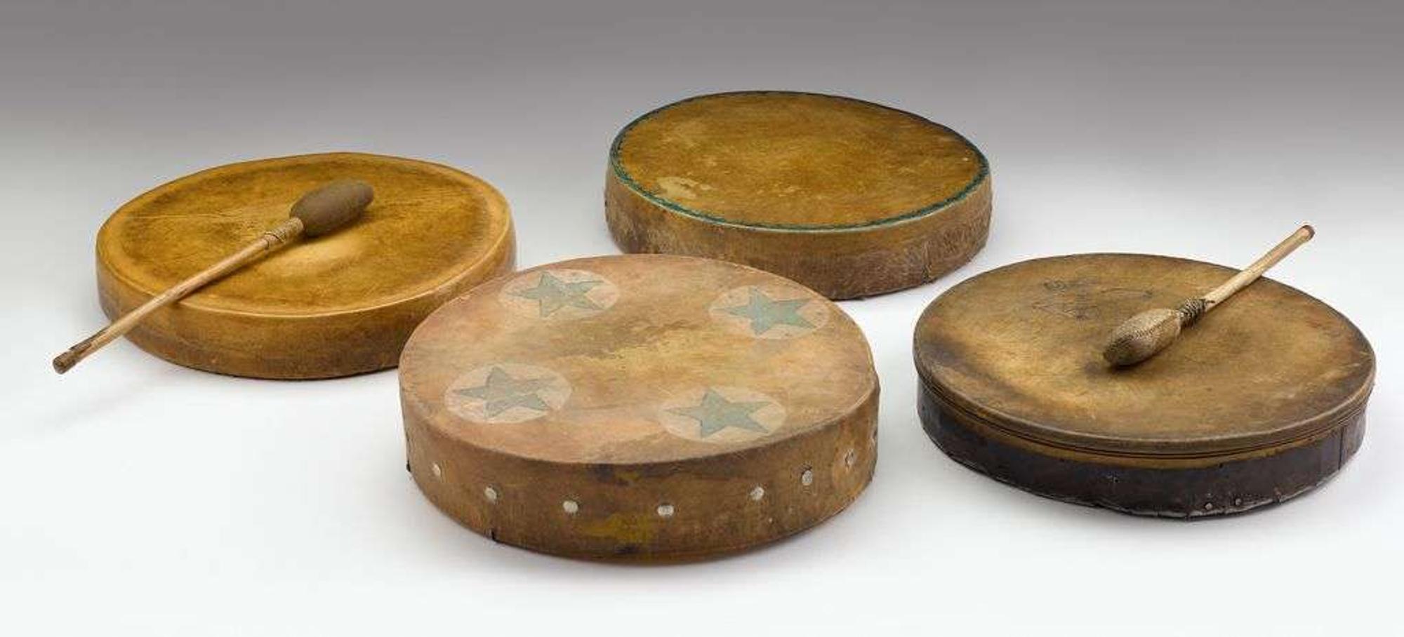 Four hide-covered Sioux hand drums fort yates, north dakota, early to mid 20th century