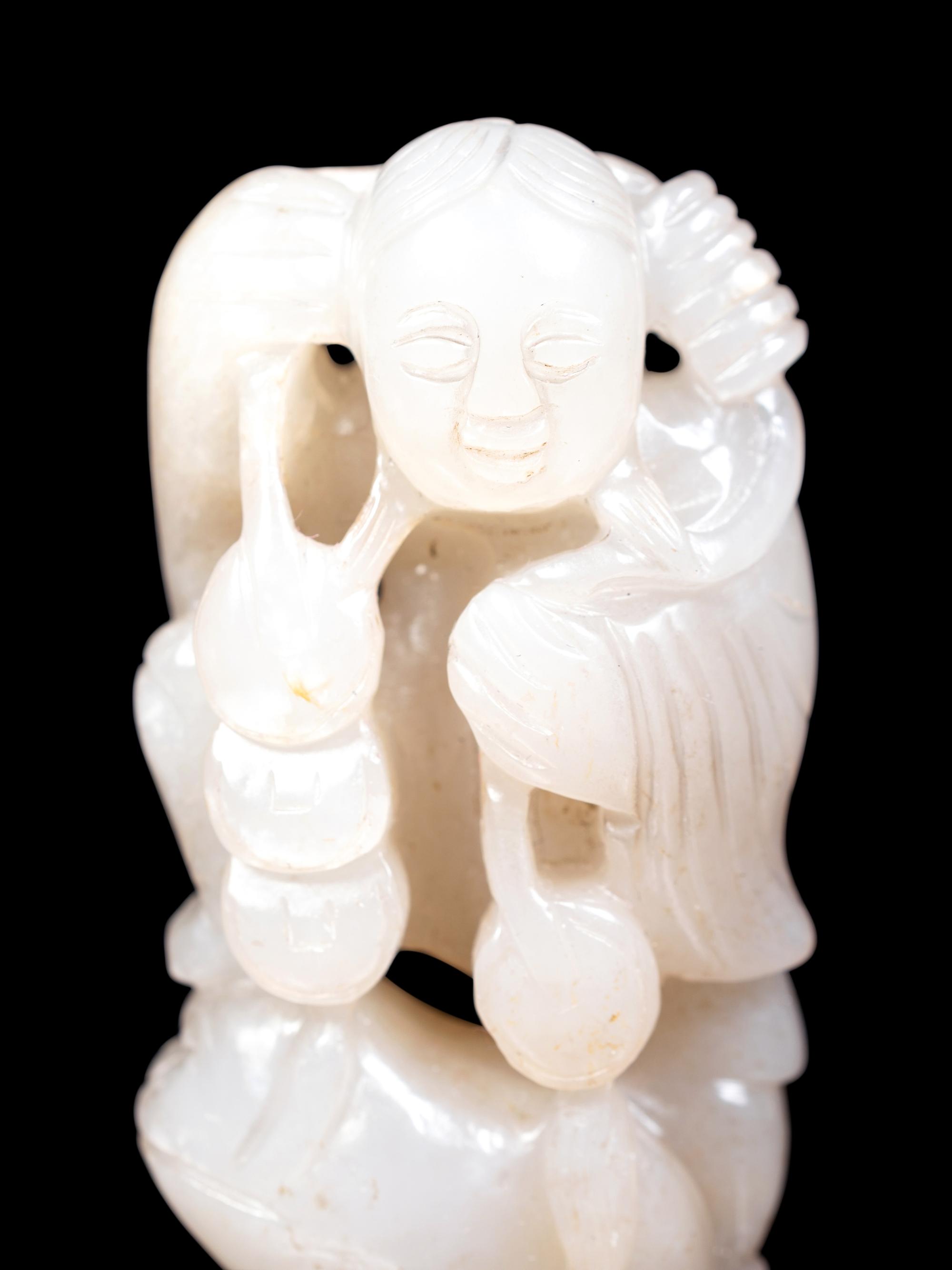 Three Chinese Celadon Jade Carved Figures of Immortals