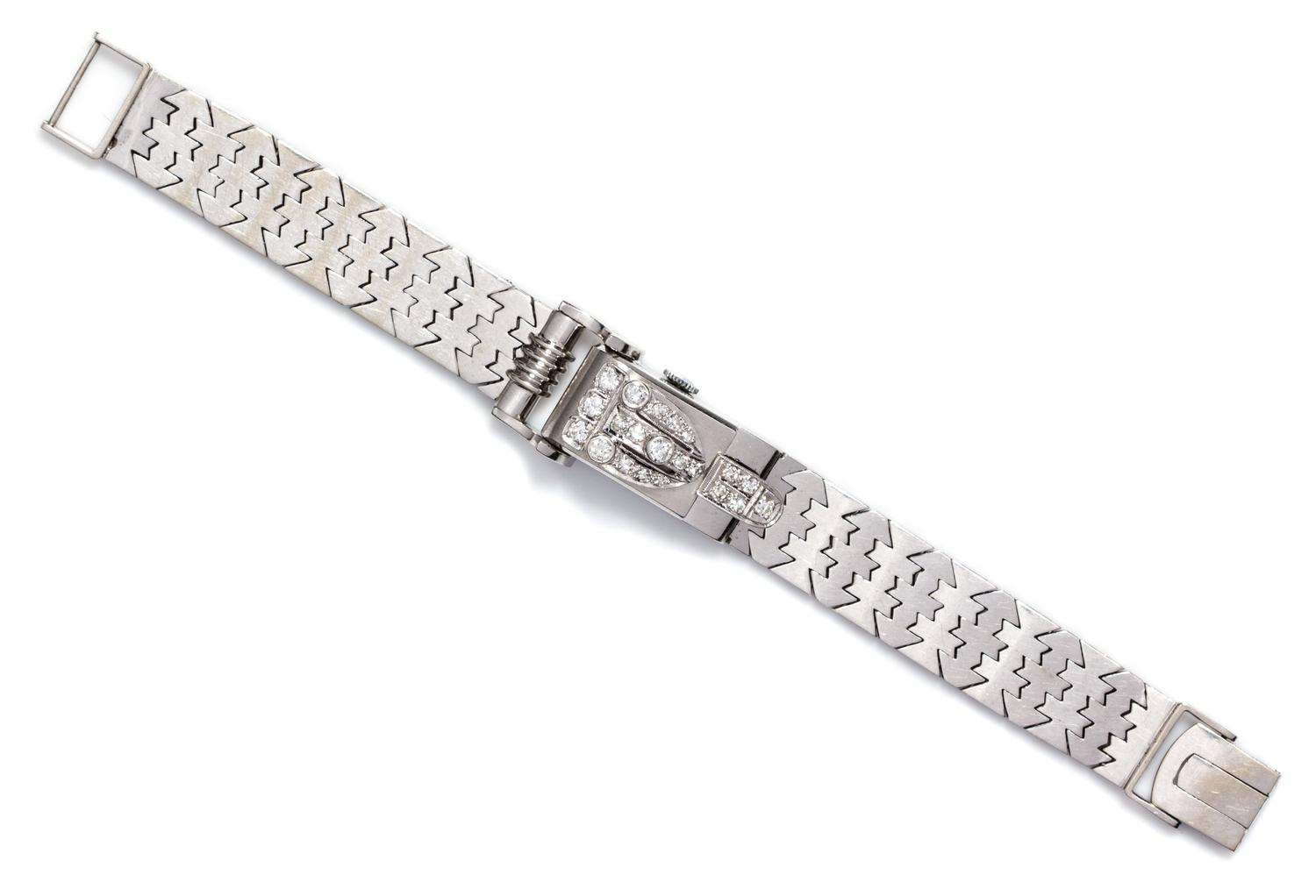 A Retro White Gold and Diamond Surprise Wristwatch, 33.10 dwts.