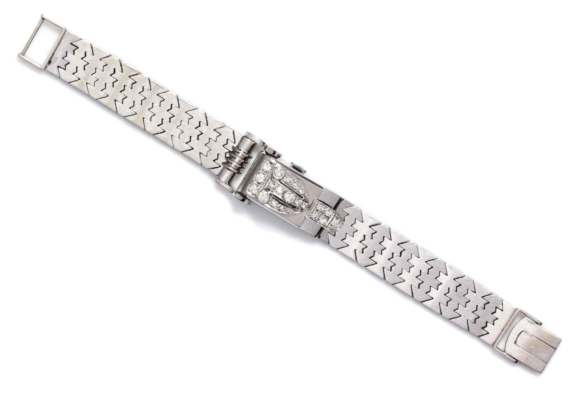 A Retro White Gold and Diamond Surprise Wristwatch, 33.10 dwts.