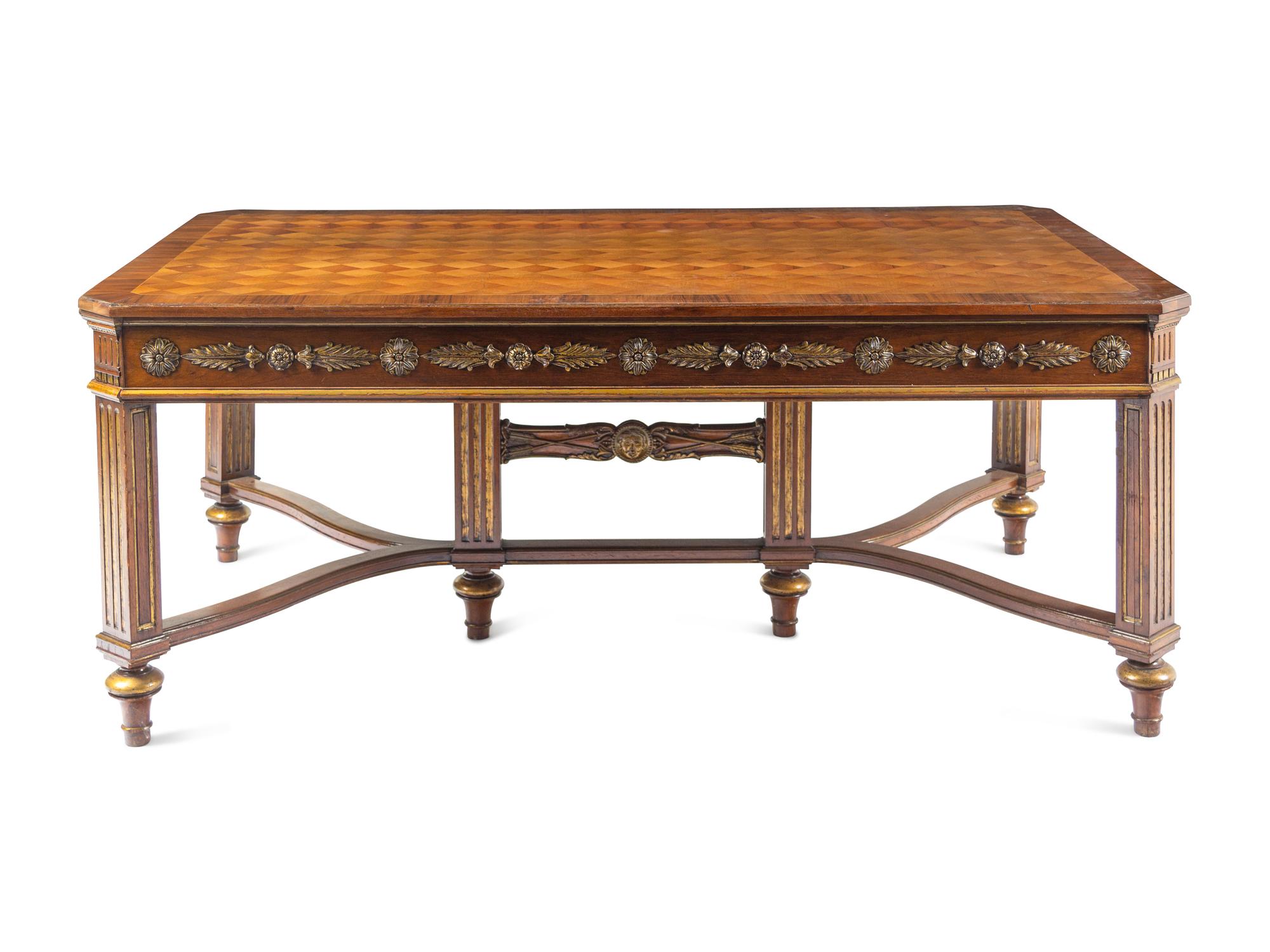 A Louis XVI Style Parcel Gilt Parquetry and Walnut Dining Table