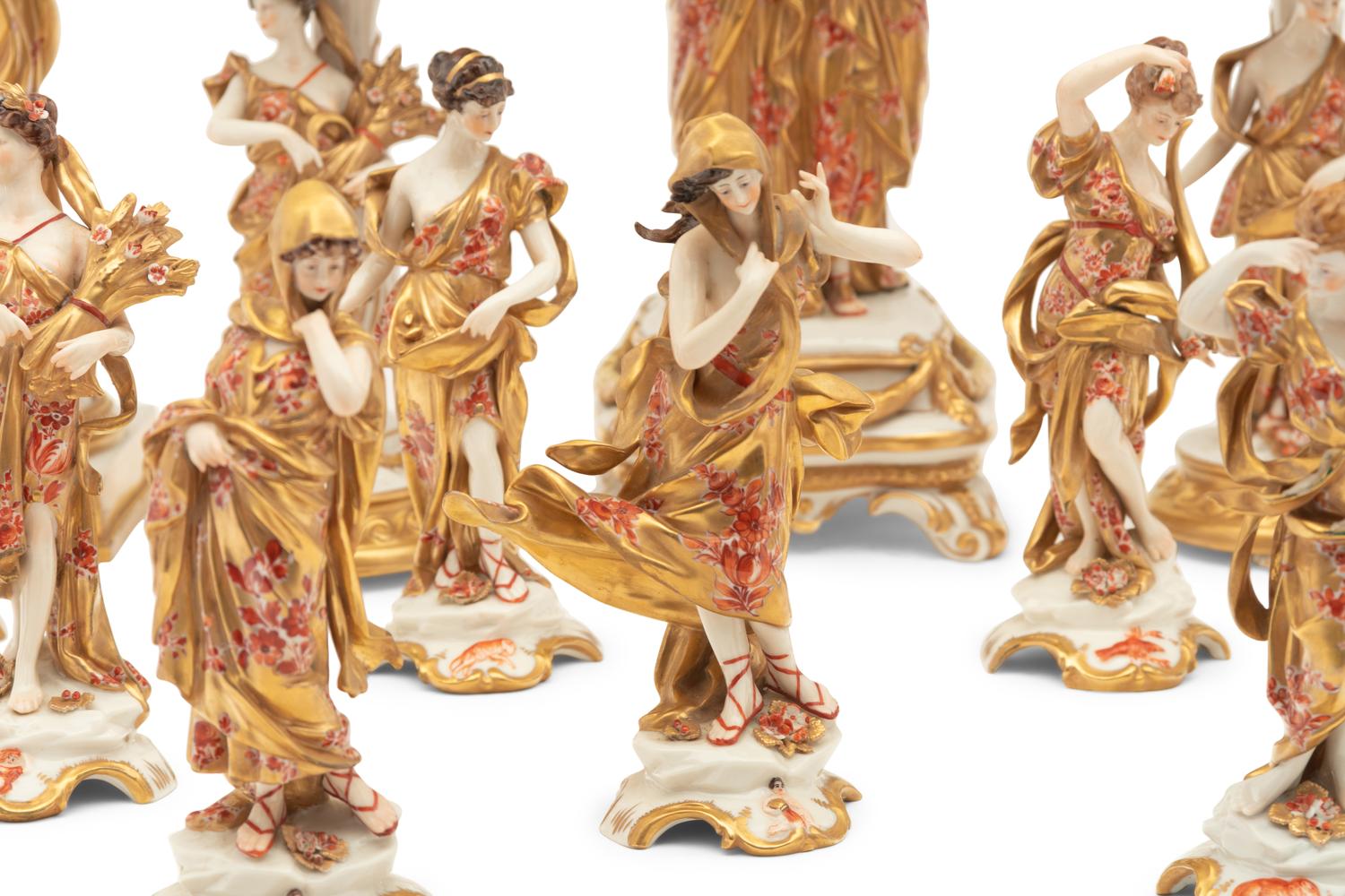 A Capodimonte Porcelain Figural Seventeen-Piece Table Garniture