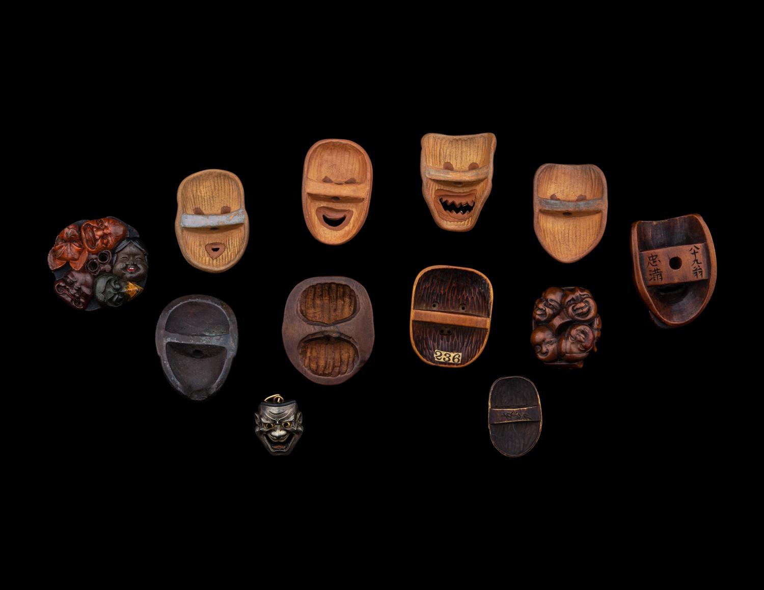 12 Japanese Wood and Metal 'Mask' Netsuke