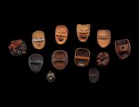 12 Japanese Wood and Metal 'Mask' Netsuke