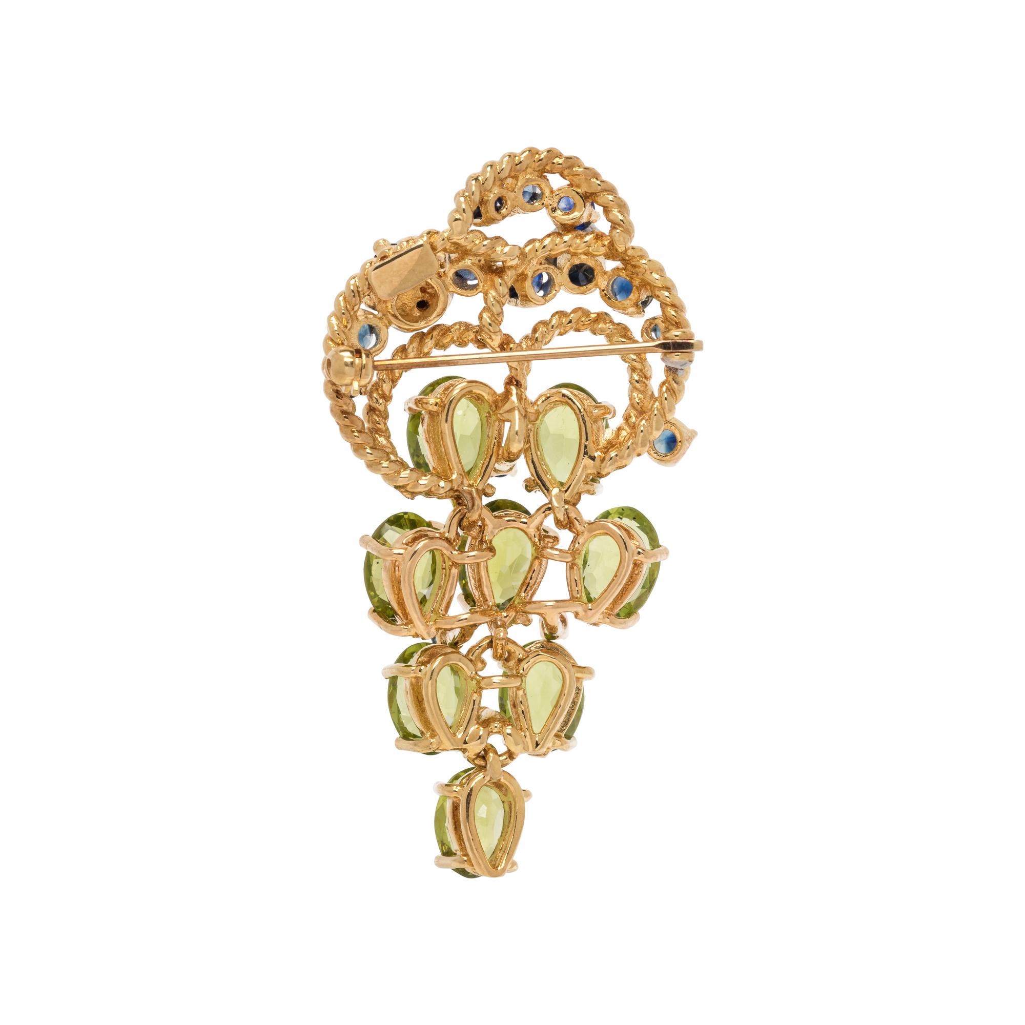 YELLOW GOLD, PERIDOT AND SAPPHIRE BROOCH