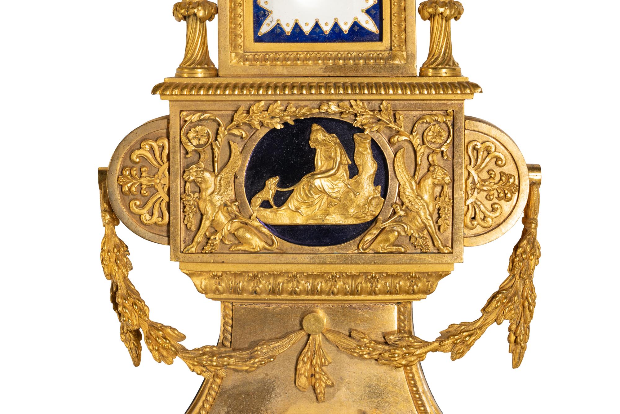 A French Gilt Bronze, Blue Steel, and Enamel Cartel d'Applique and Barometer