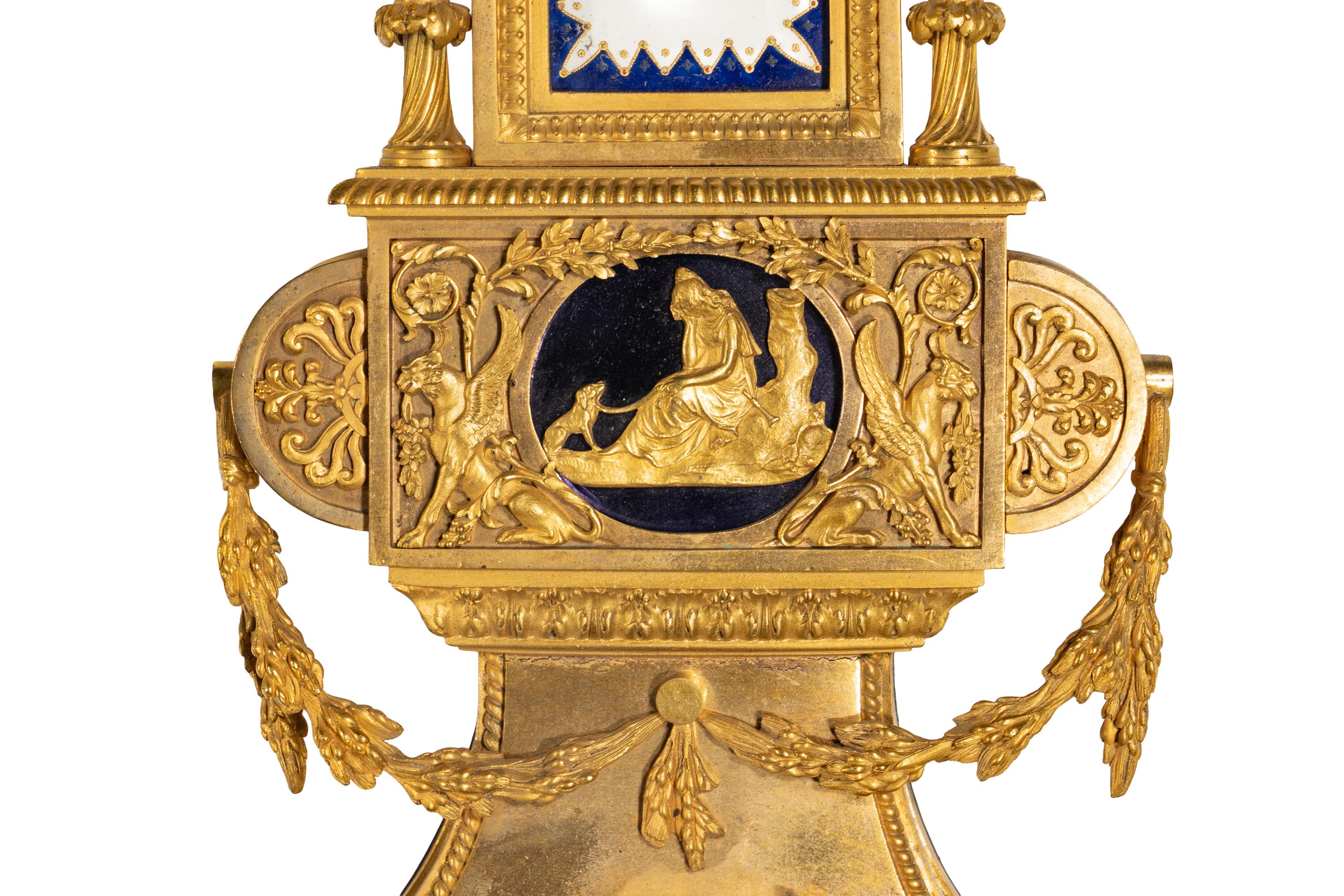 A French Gilt Bronze, Blue Steel, and Enamel Cartel d'Applique and Barometer