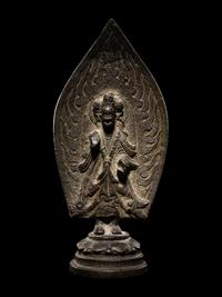 A Bronze Votive Figure of Buddha