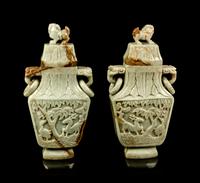 A Pair of Chinese Carved Celadon Jadeite Covered Vases